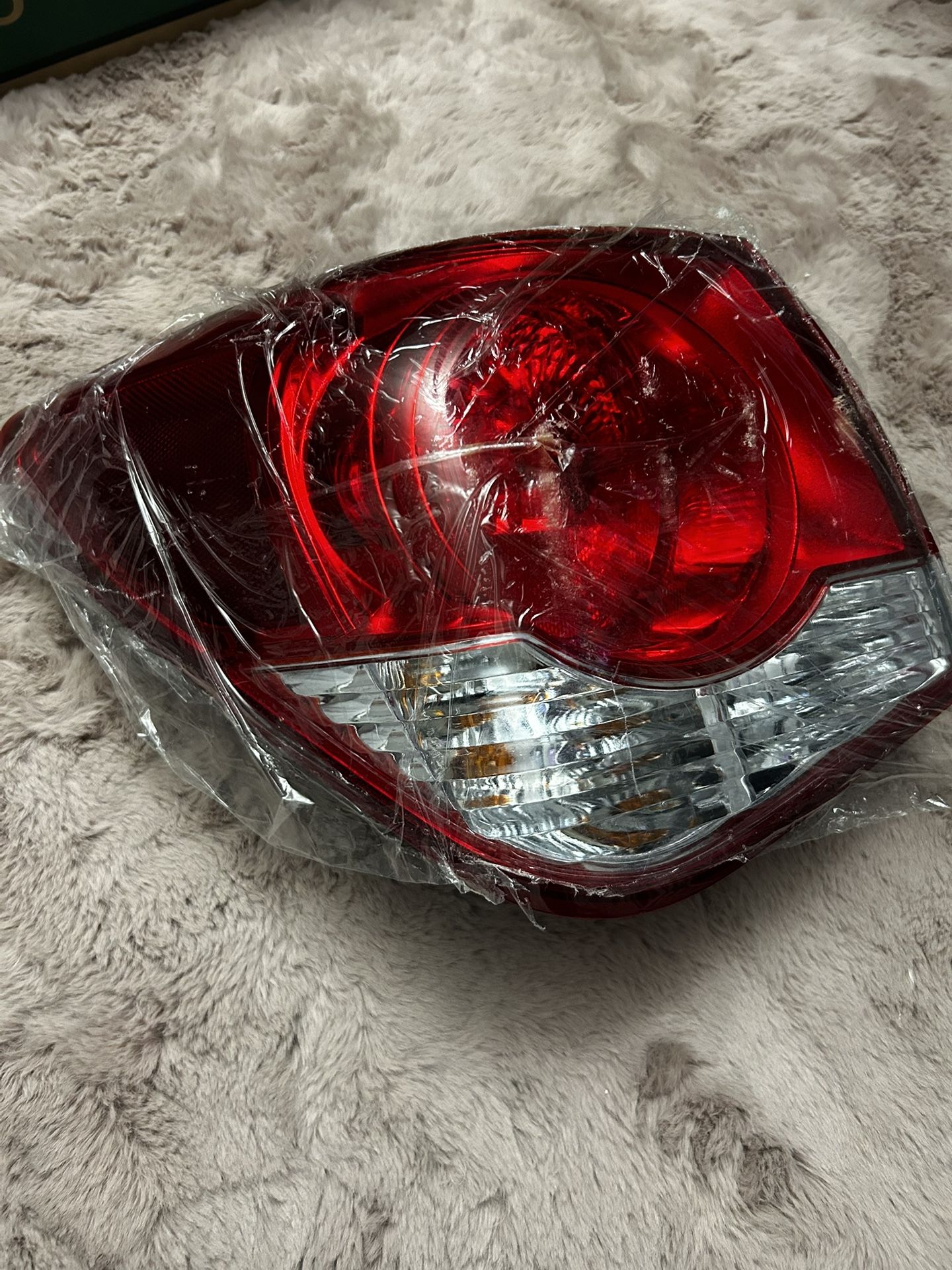 Chevy Cruze 2009 To 2014.  Passenger Rear Tail Light”. Door Handle Insert Accents Never Used  Both For !   $80. Or I Can Sell Them Separed”””.     OBO