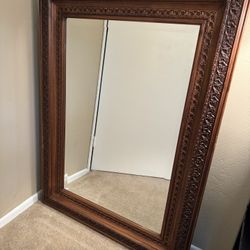Mirror With Handsome Carved Brown Wood Frame