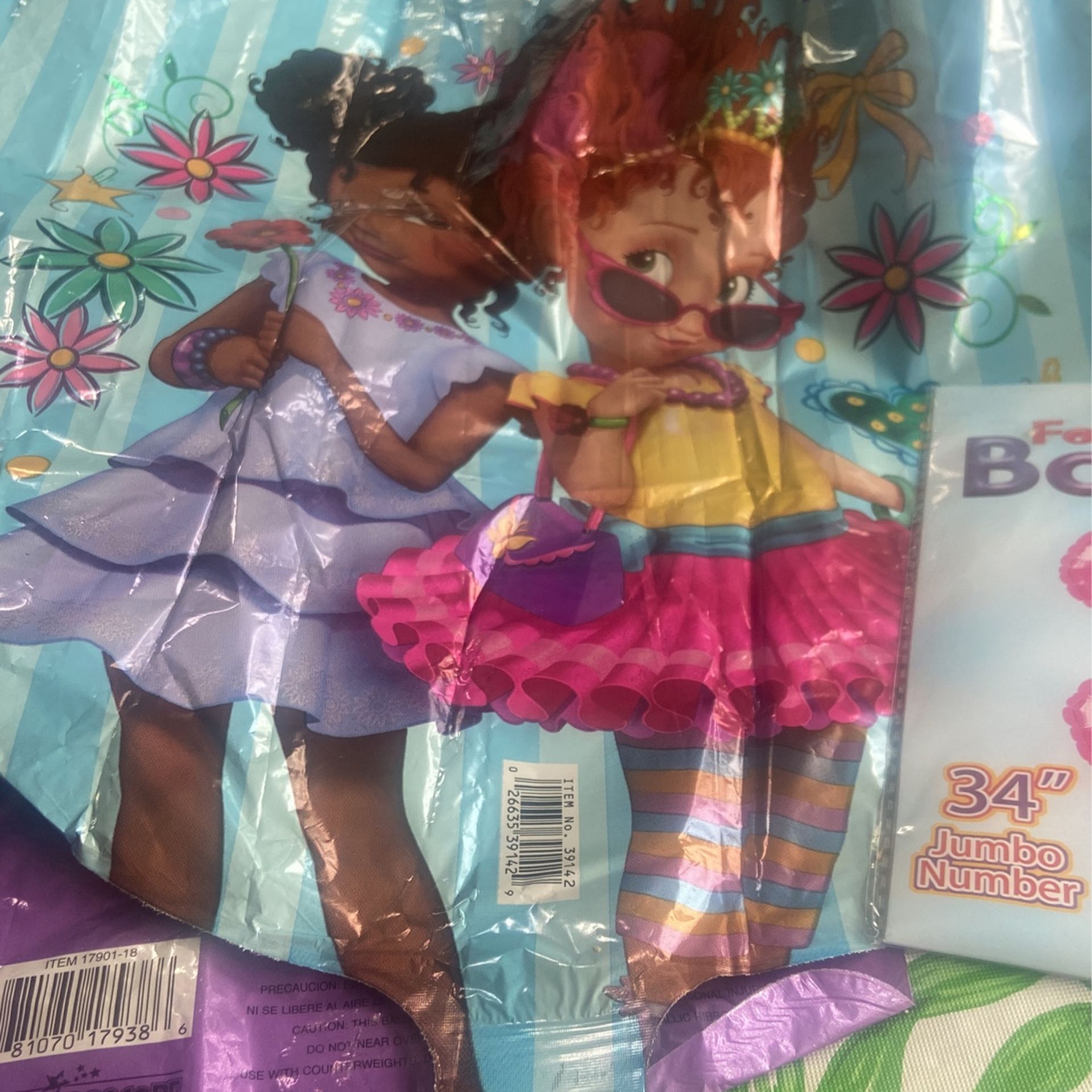 4 Fancy Nancy Mylar Balloons And A Number 3 Mylar balloon Never Used