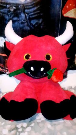 Large black and red bull plush
