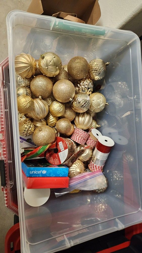 Tote Of Christmas Ornaments And Ribbon