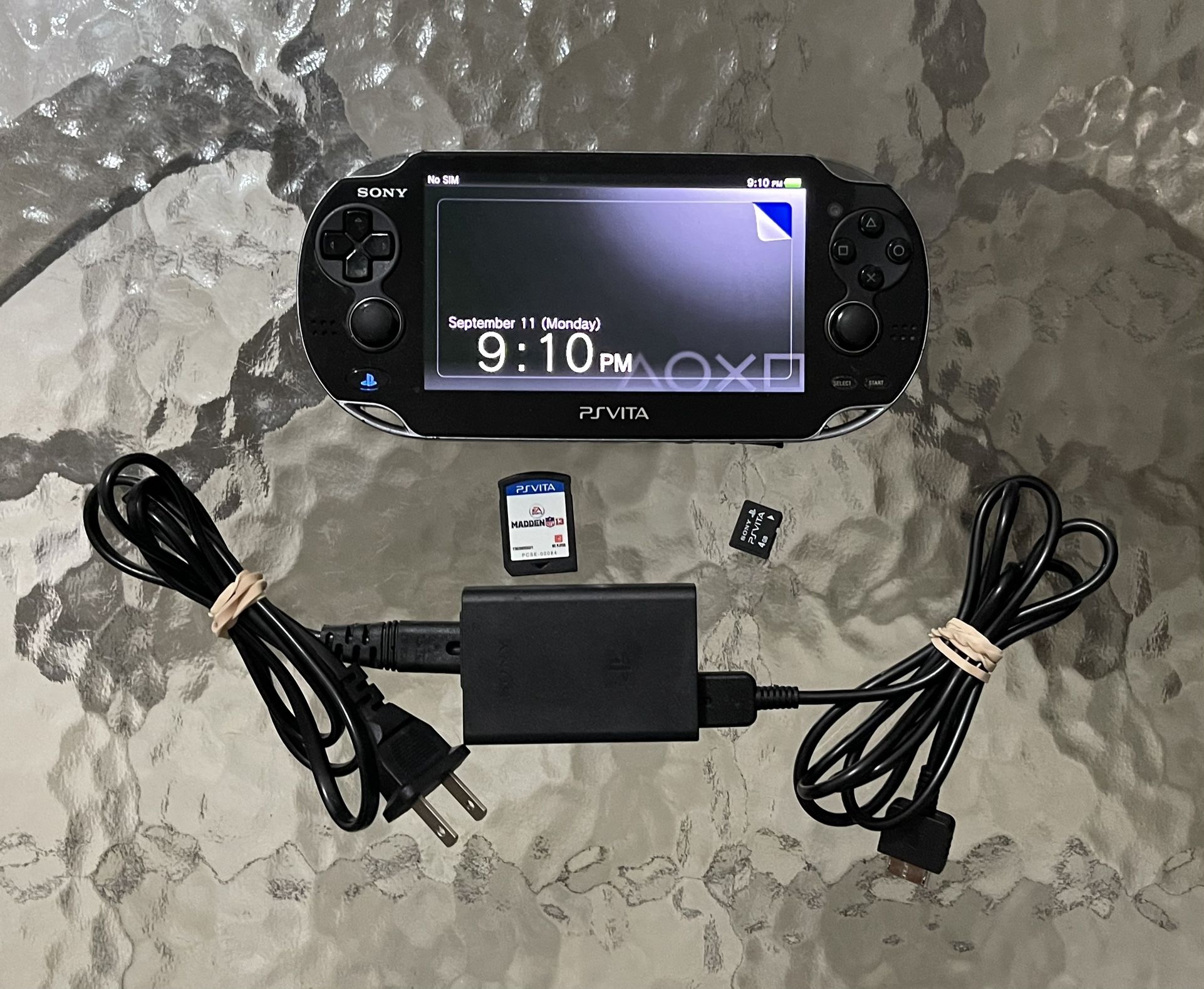 Sony PS Vita Model # PCH-1101 + Madden 13 Game + Sony PSVita 4GB Memory Card + OEM Sony PS Vita Charger Bundle - All Fully Functional