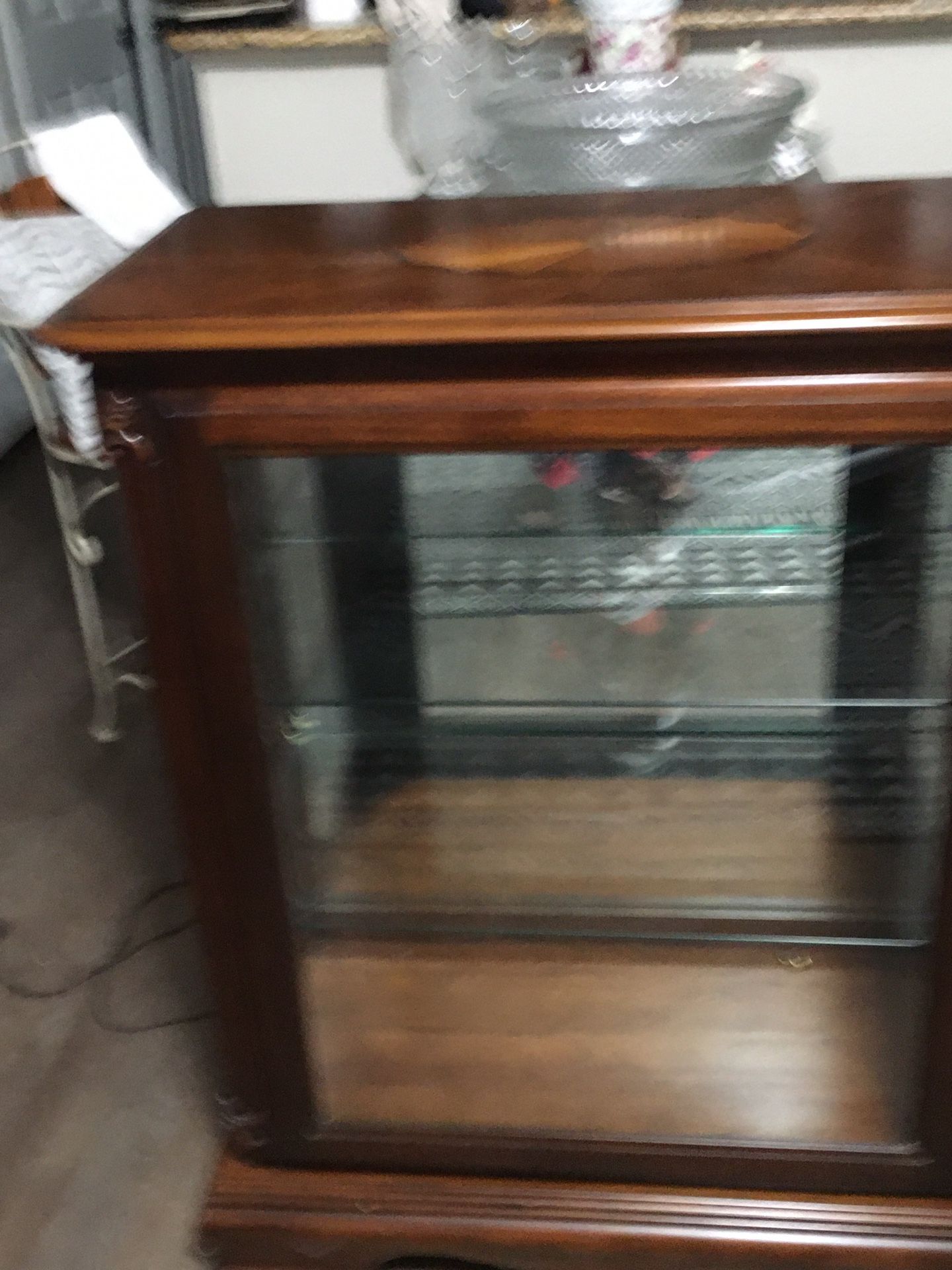 Curio Cabinet 34 1/2 W X 17 D X 44 1/2 H  No Phone Number 