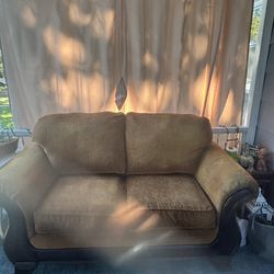 Brown Sofa, Bought From Rooms To Go Has Wood on Front