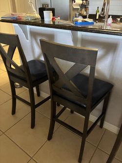 2 wood bar stools