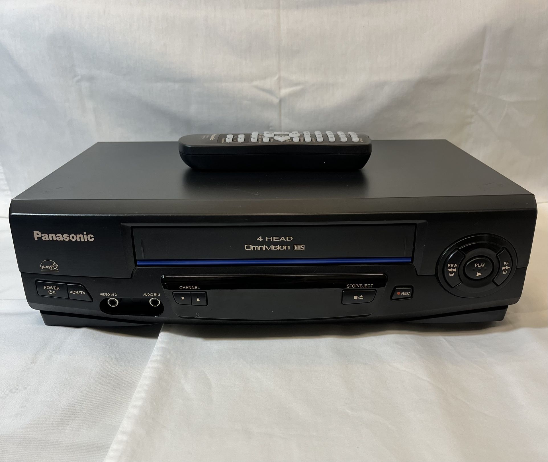 Panasonic PV-V402 VCR with remote. Everything works.