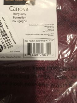 Two burgundy valances