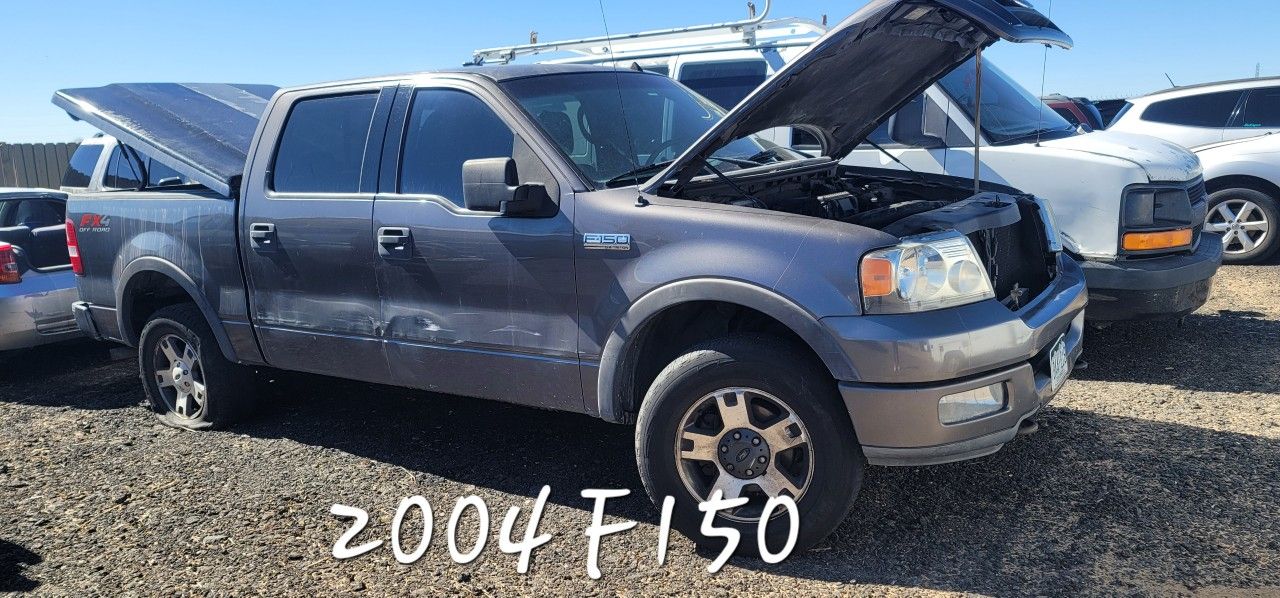 PARTING OUT OR COMPLETE, 2004 F150, 2003 Envoy, 1999 Explorer, 2002 GMC 