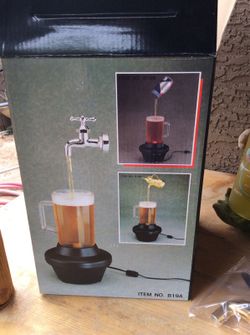 Lighted pitcher magic fountain mug