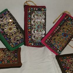 Embroidered wristlets
