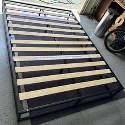 Full size bed frame in excellent condition 