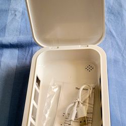 Wireless cellphone and jewelry sterilizer