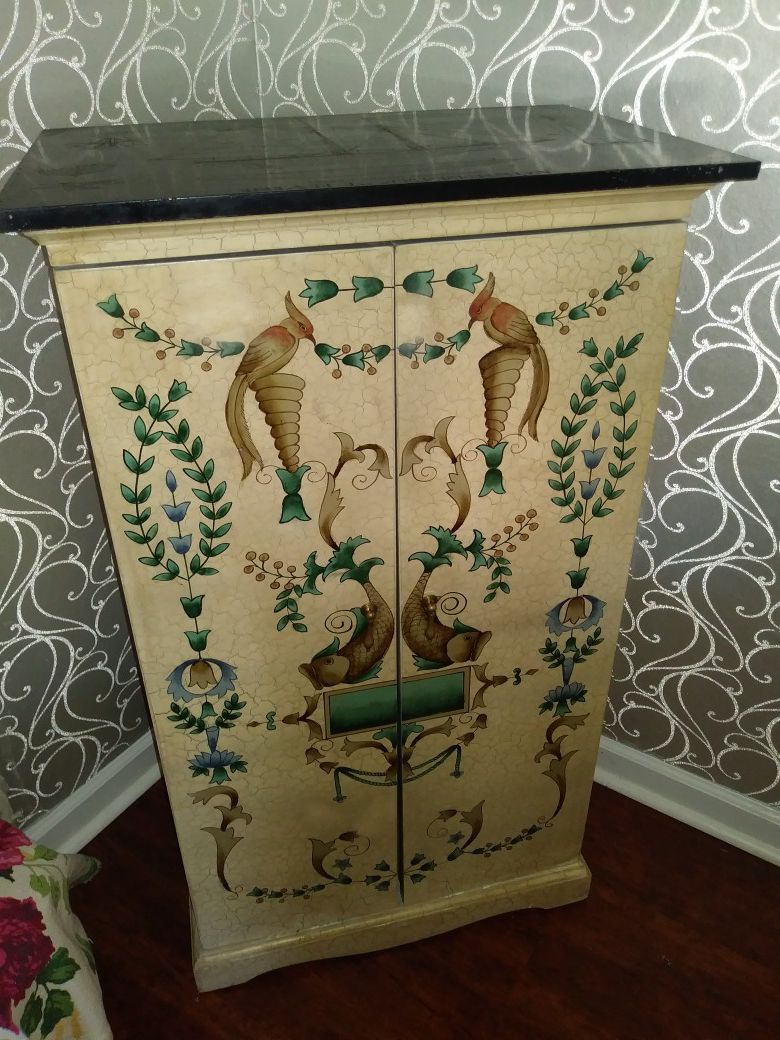 Oriental style 2 door cabinet with storage shelves for sale
