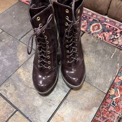 Maroon Stiletto boots that have side zippers 