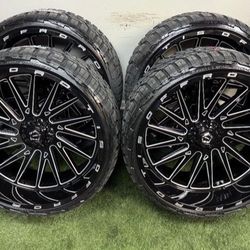 NEW 26x12 tis wheels wrapped in 305/30r26 tires SAME AS A 33