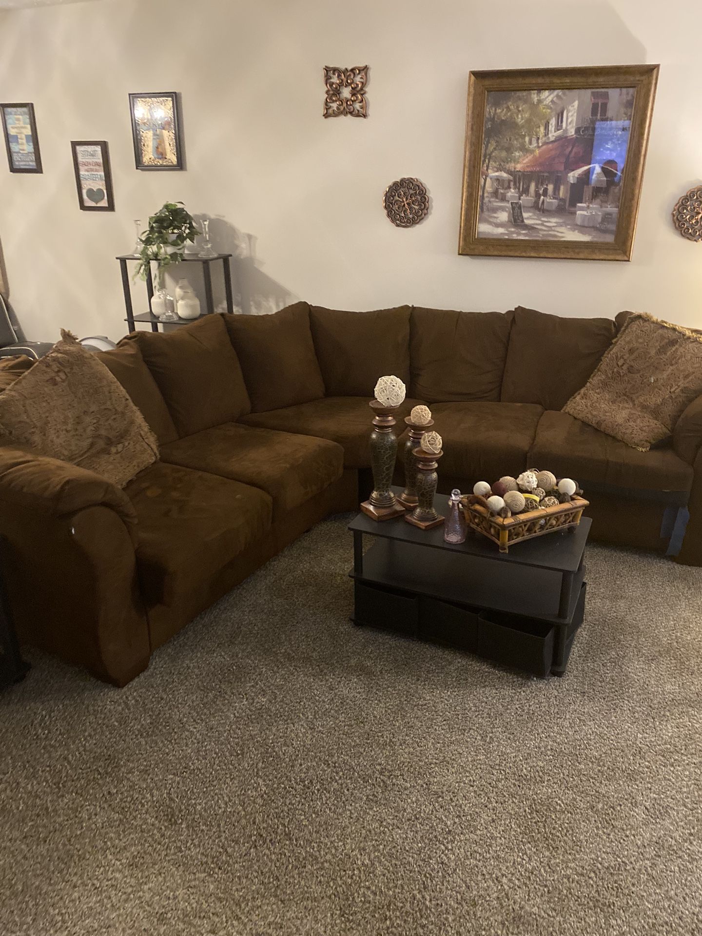 Ashley Stewart Section Sofa Table And Two Chairs And A Sleeper Bed