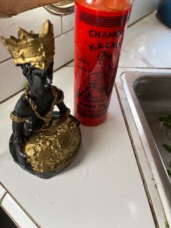 Chango Santeria buena suerte candle and statue