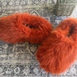 Fuzzy orange slippers