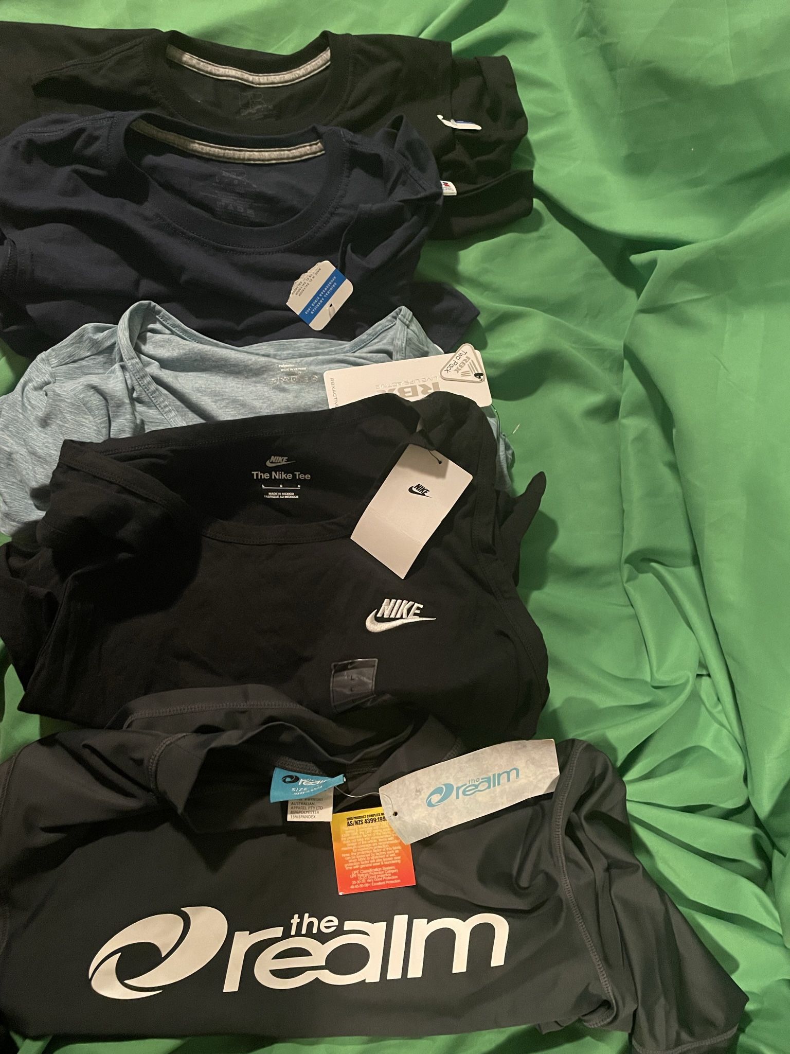 Only 20-T-Shirts Left: (Nike, Russell, Realm) New With & Without Tags.