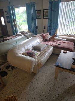 Couch with lounger in bone colored leather