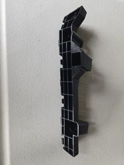 New OEM Honda 71198-TK8-A00 Spacer Bumper, left Front, Driver Side