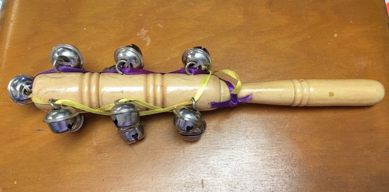 Wooden jingle bell rattler