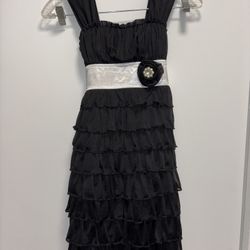 Girls youth Black Ruffled Dress with Silver Sash. Size 8 kids