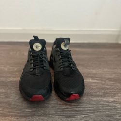 Nike, air huarache, black with red bottom 11.5