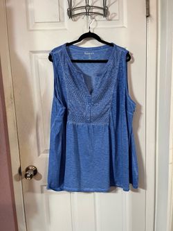 Women’s Size 3X SleevelessTop.  Color Blue.  Made of 100% Cotton.  Preowned only wore twice.  Has been hanging in the closet.  .