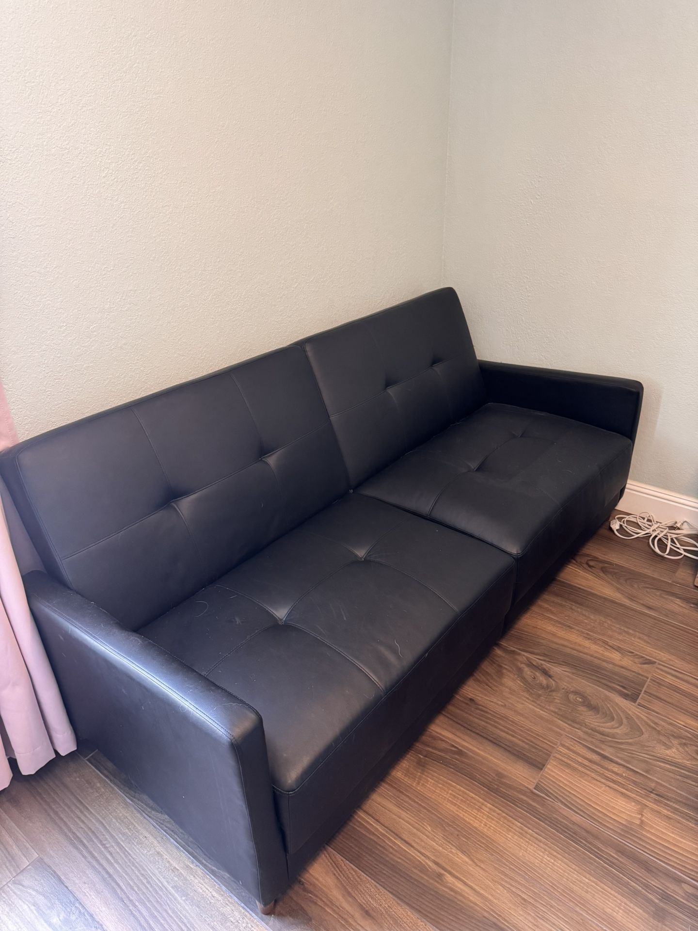 Black Fake leather couch/futon