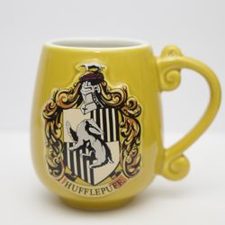 Harry Potter Embossed House Hufflepuff Crest 16 Oz. Ceramic Coffee Cup Mug New
