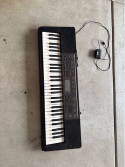 Electric piano with stand
