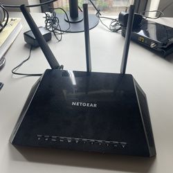 Netgear CM500 + Nighthawk AC1750 modem and router -