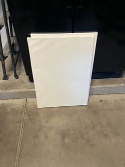 2 white canvases