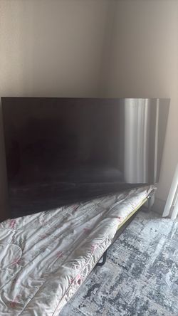 TCL  65 “