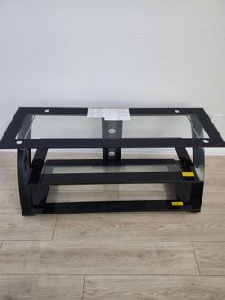 Selling a nice black glass TV stand/entertainment center.