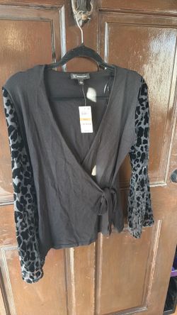 Black long sleeve Inc shirt