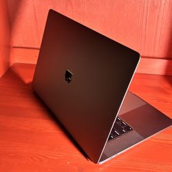 Apple MacBook Pro 15” Retina Touch Bar, I7, 16GB RAM 512GB SSD macOS 13 Ventura $460