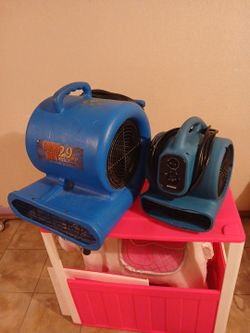 Two carpet or floor dryers both with Outlets smaller one with three settings and timer