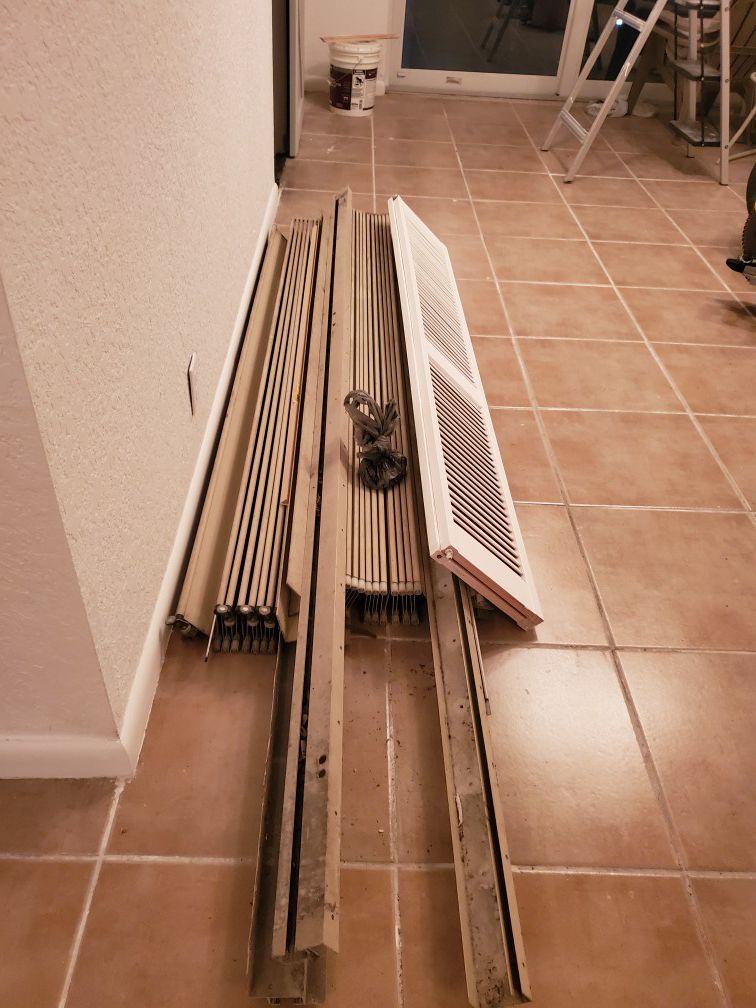 Complete accordion hurricane shutter for patio doors approximately 10 ' x 7'