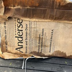 Storm Glass Door Brand New .. Just Box Is Has Been Wet From Rain . 