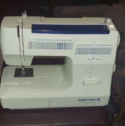 Sewing machine with cover and portable serger