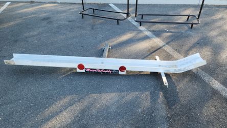 Motorcycle hitch carrier