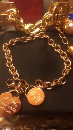Women's roles gold bracelet