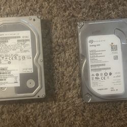 2 Hard Drives 2tb Hitachi, And A Seagate 1tb