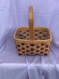 5$ Vintage Basket with handle lined with plastic.