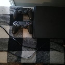 Nearly New PS4 with 2 Controllers (Used Once) - $130