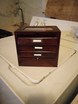 Wooden music box picture frame.