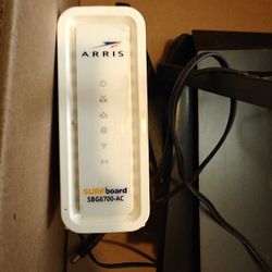 Arris Surfboard Cable Modem/ Router And Netgear Router R700