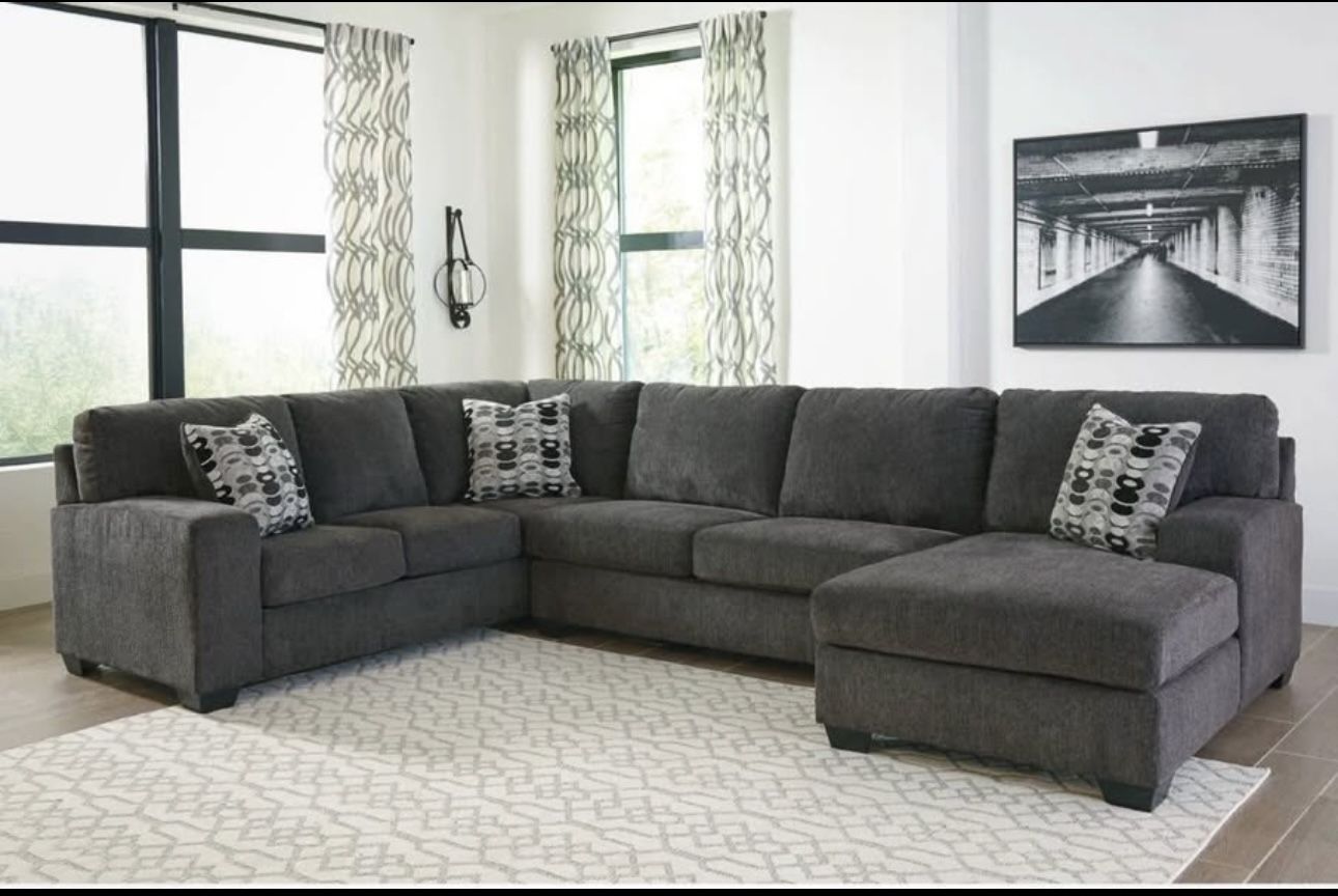 Three Piece Grey Sectional 